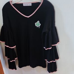 Black AKA V-Neck Sweater with Pink Trim